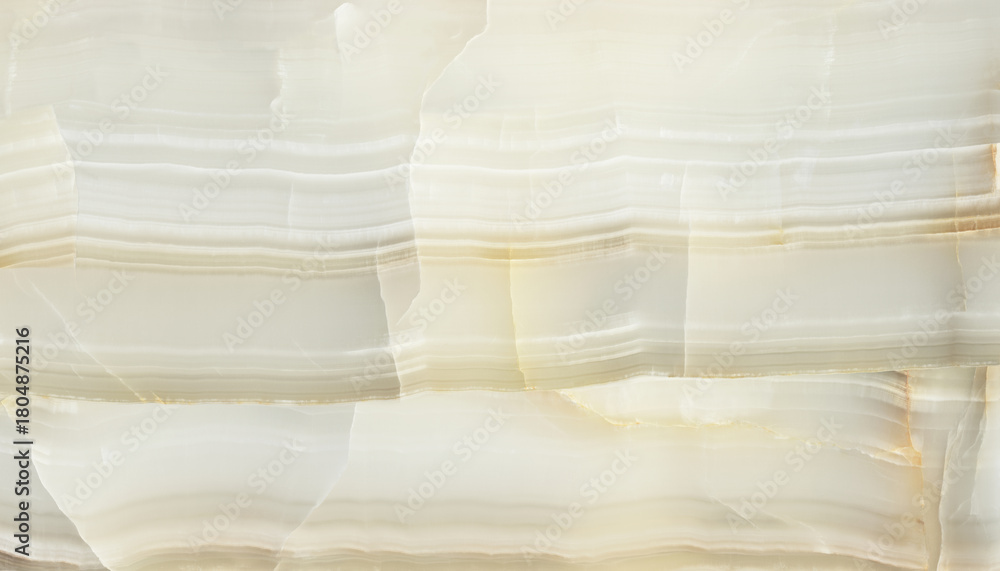 Obraz premium Detailed Polished White Onyx Marble Surface Background with Prominent Translucent Gold Horizontal Bands