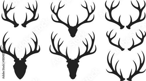 Collection of various black deer antler silhouettes, featuring three full stag heads and three isolated sets of majestic antlers, ideal for hunting and wildlife designs