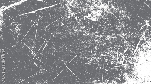 Grunge texture background with white scratches and speckles on a dark gray surface vector
