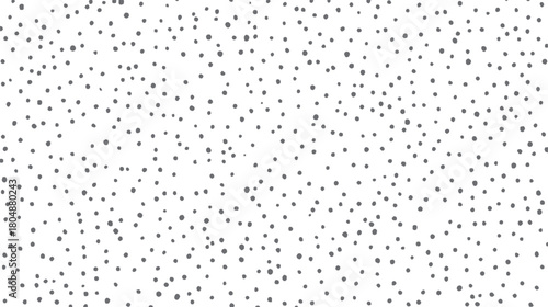 Scattered irregular dark grey dots on a white background abstract pattern texture vector