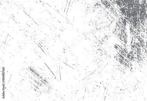 White textured background with dark grey scratches and speckles creating a distressed and weathered effect
