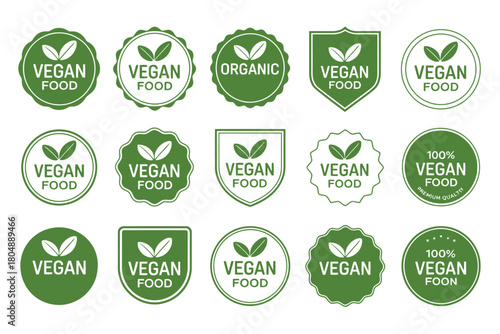 A collection of green vegan food labels and badges with leaf icons.