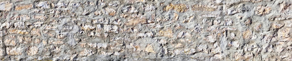 Fototapeta premium Beautiful rustic stone wall in poster size.