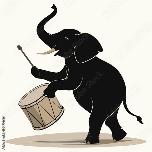 Elephant playing a drum with a drumstick animal circus