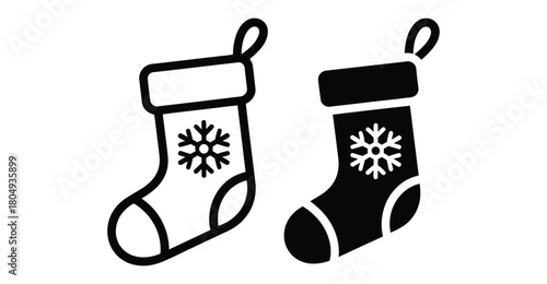  Minimalist Christmas stockings with snowflake design in black and white, festive holiday decoration icon with hanging loops