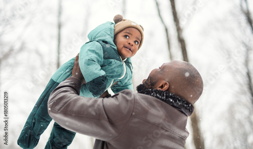 father and baby in winter forest with parents and kids love relationship having warm clothes for cold climate