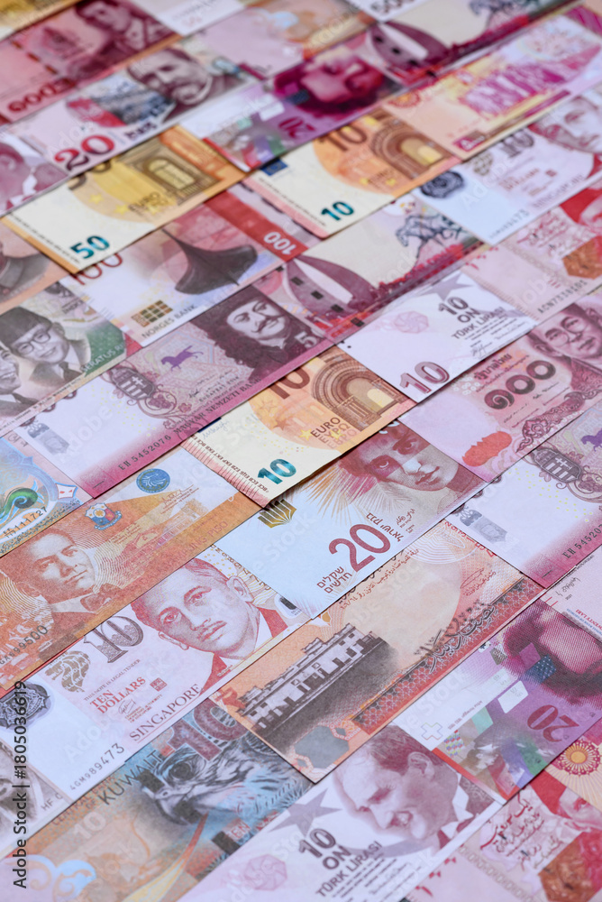 Fototapeta premium Money background, currency exchange, paper banknotes from different countries. Money cash currency