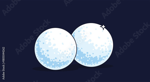 Two sparkling, pristine snowballs ready for playful winter activities, set against a deep dark blue background.