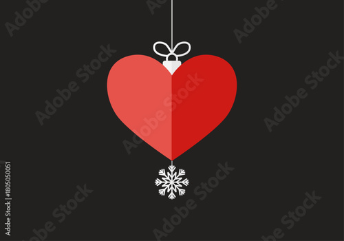 Adorno navideño en forma de corazón rojo colgando con un copo de nieve sobre fondo negro