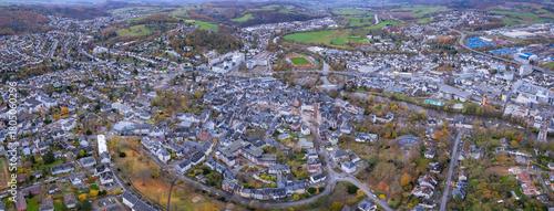 An aerial panorama view above the old town of the city Wetzlar on an early summer morning in Germany