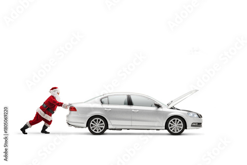 Santa Claus pushing a car with an open hood