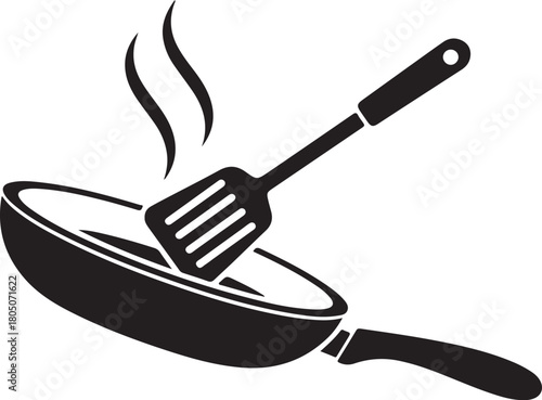 Frying pan with spatula and steam