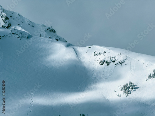 Ski lines on a snowy mountain