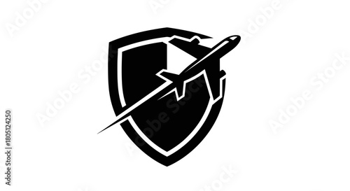 A black and white logo featuring a shield with an airplane flying diagonally across it, symbolizing travel protection and security.