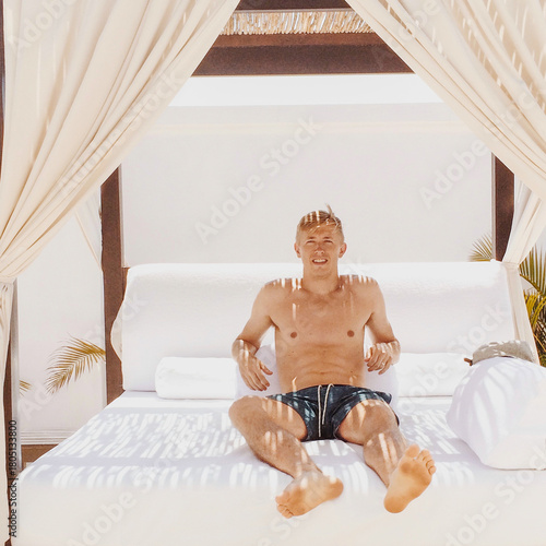 Fit Blonde Male Relaxing on Vacation