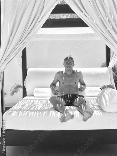 Fit Blonde Male Relaxing on Vacation