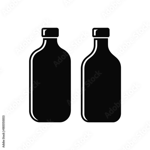 Two identical black bottles stand side by side against a white background.
