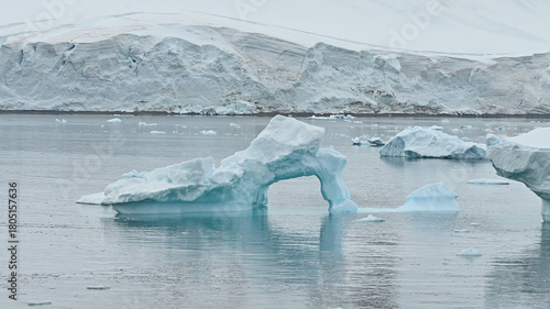 An iceberg in Antarctica appears as a high heel shoe.