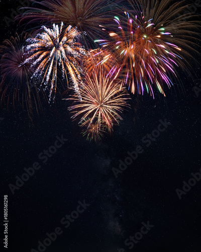 Stars and colorful holiday fireworks for New Year banner