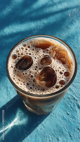 Enjoying a Refreshing Iced Coffee on a Sunny Day Outdoors
