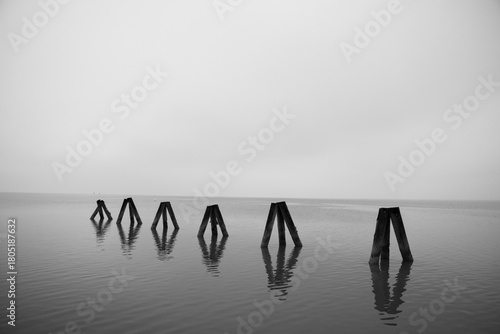 Scenic view of Neusiedler See from the beach in Podersdorf, showing calm water, soft shoreline, and a peaceful lakeside atmosphere at this popular Austrian destination.