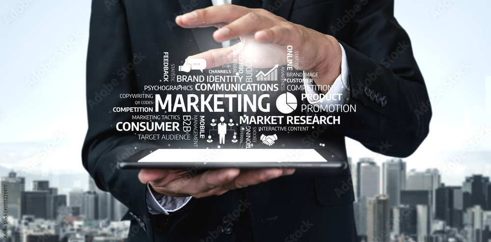 Fototapeta premium A professional figure in a suit displays a tablet with floating marketing concepts. The urban backdrop blends the digital world with real-life business strategies. Tessel