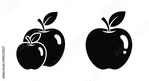 Simple black and white illustration depicting two apples and a small leaf