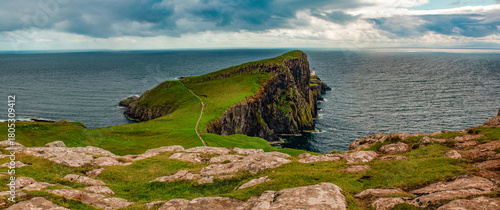 Scotland, United Kingdom: aerial view of the sheer cliff of Neist Point lighthouse (1909), famous promontory and viewpoint on the most westerly point on the Duirinish peninsula on the Isle of Skye
