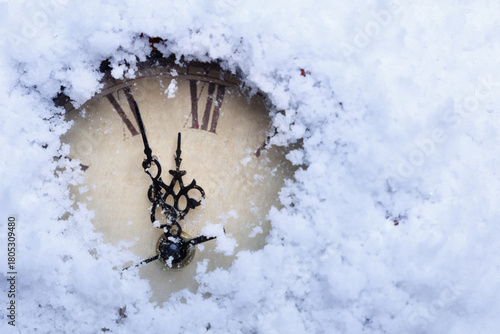 time halts beneath snowy silence, still clock hands over snow symbolize seasonal tranquility