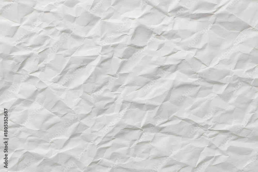 Obraz premium Crumpled white paper with natural folds and creases, realistic texture style, on a neutral background. Concept of imperfection, creativity, and material design