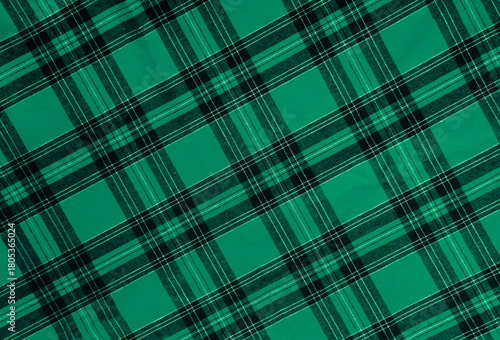 texture of  green black white diagonal checkered fabric pattern background. traditional tablecloth checkered as backdrop. top view. Merry christmas happy New year holiday Holiday event