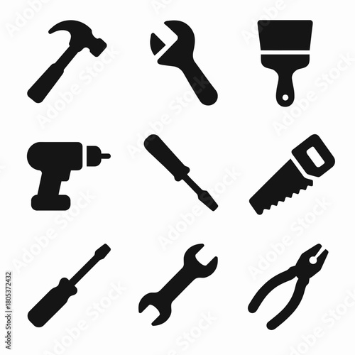 Silhouette icons of essential hand and power tools