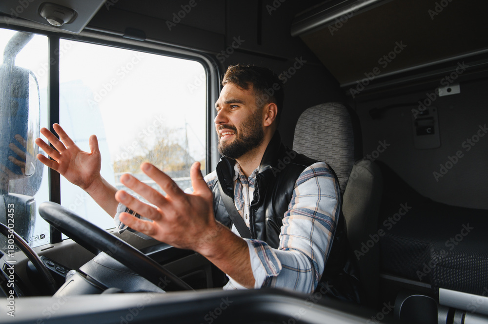 Obraz premium Truck driver expressing feelings while driving a vehicle