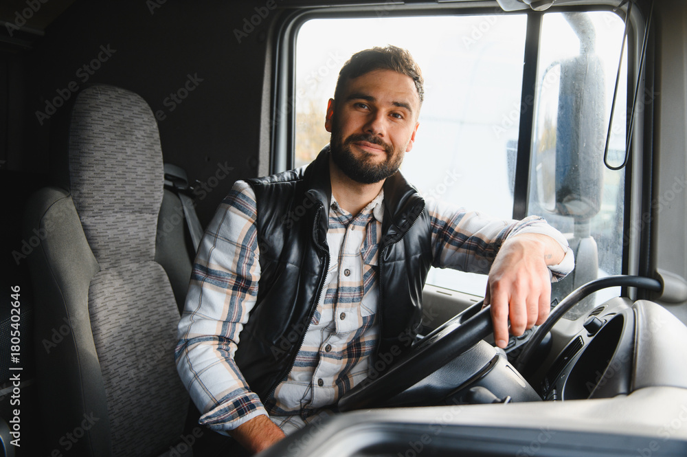 Obraz premium Happy man driving truck working in transportation
