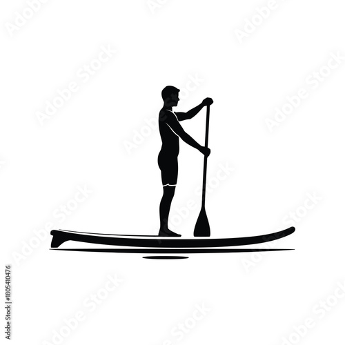 Man paddleboarding on a calm water silhouette