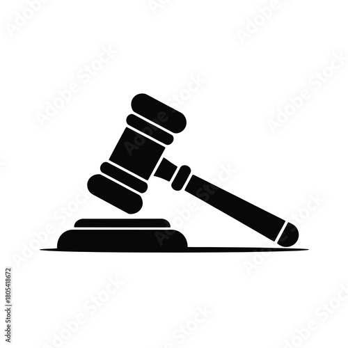 Black silhouette of a judge s gavel and sounding block