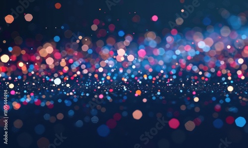 Abstract bokeh lights background with festive blue and pink colors
