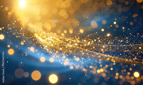 Abstract flowing golden particles on dark background for festive season