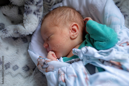 Newborn Baby Sleeping Peacefully on Soft Blanket