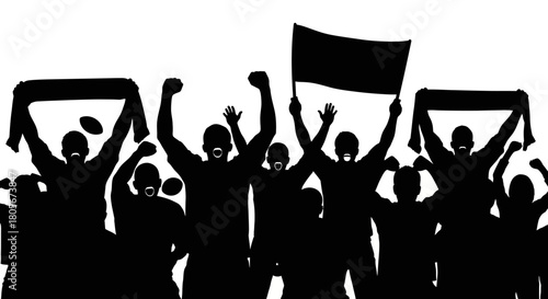 A crowd of silhouetted people cheers some holding a banner and flag with raised arms and open mouths