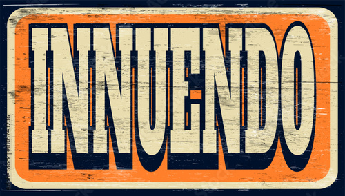 Aged retro innuendo sign on wood