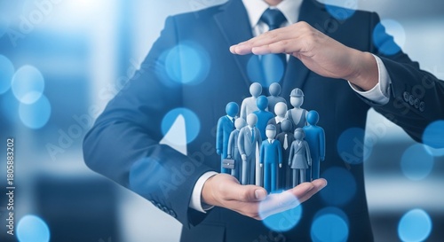 Business professional cradling a group of people, symbolizing protection, human resources, and community care