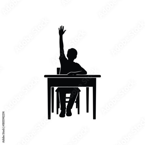 Young student raising hand eagerly at desk silhouette