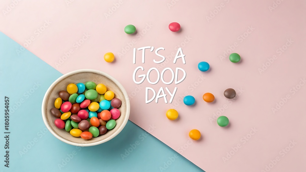 Obraz premium Colorful candies and a positive message on a split background