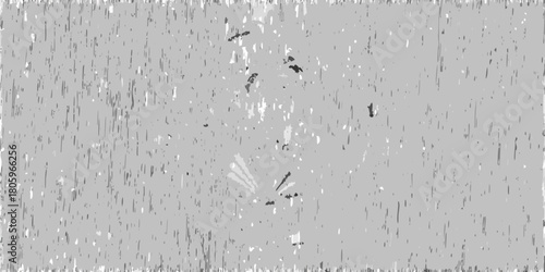 Abstract distressed grunge background with vertical lines and scattered speckles in grayscale tones