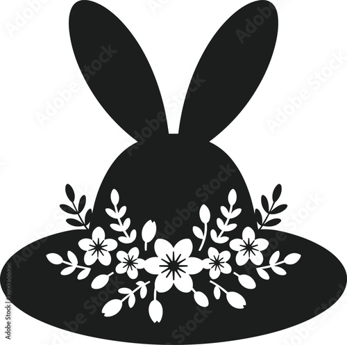Black silhouette Easter bonnet with bunny ears and white floral decoration
