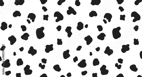 Dalmatian pattern background with black spots on white.