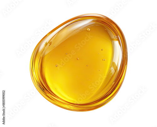 Glossy, golden liquid droplet with air bubbles, isolated on black