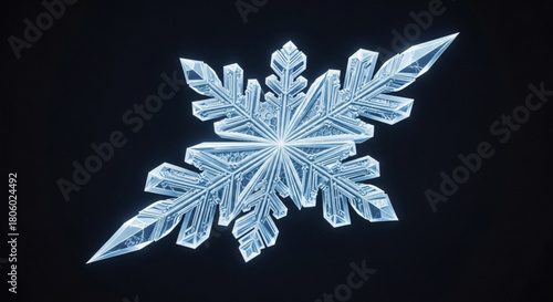 A stunning macro shot captures the intricate details of a snowflake, showcasing its delicate crystalline structure against a dark background, revealing winters beauty