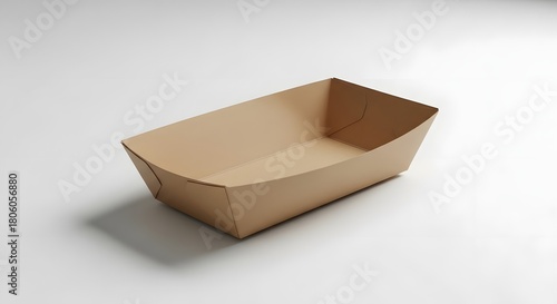 Single empty kraft paper food tray eco friendly disposable packaging on a plain white surface